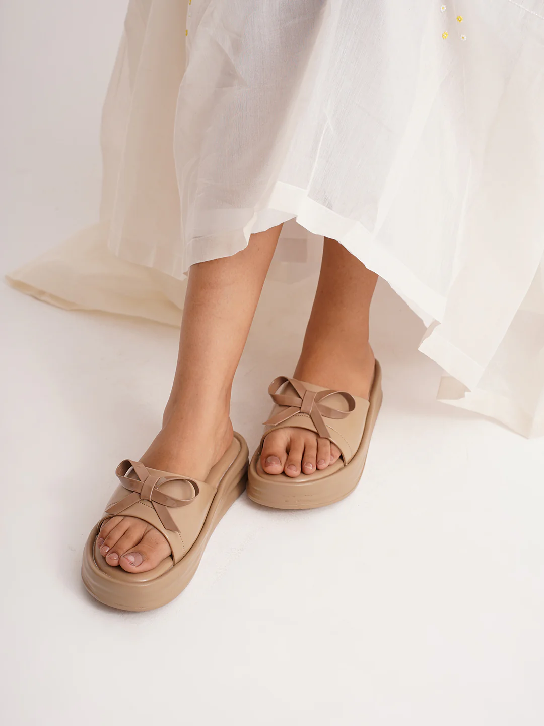 Platform Slides with Bow Accent and Cushioned Sole